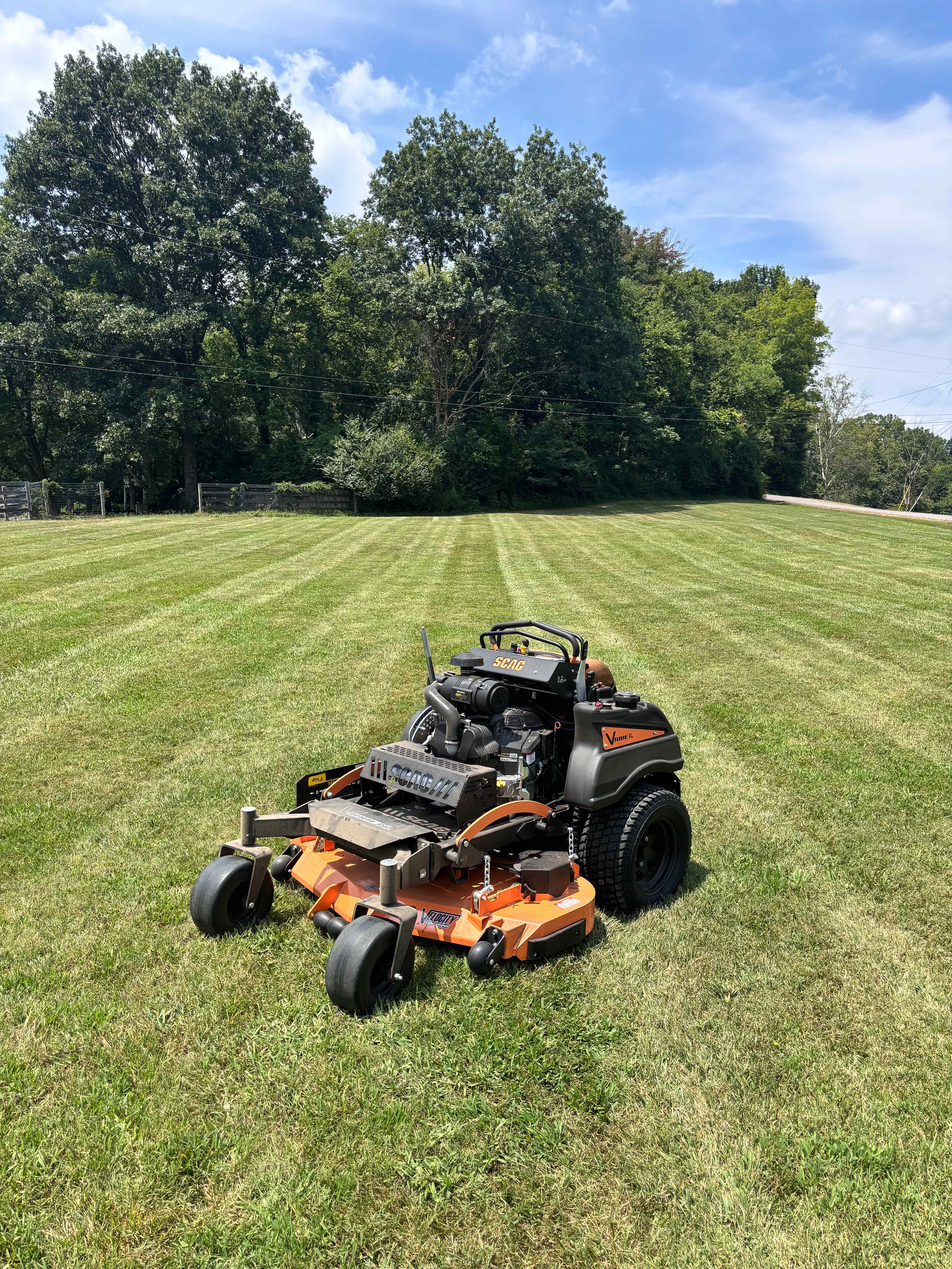 Commercial mower creating perfect stripes